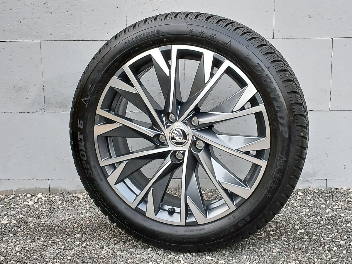 Zánovní zimní orig alu Škoda Karoq 215/50/18 vzorek 9mm - 17