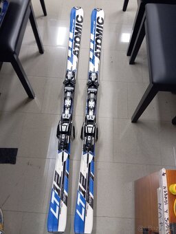 Kvalitní set pro pány lyže,hůlky, přeskáče - možný dovoz - 17