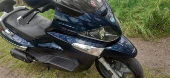 Piaggio X evo 125 - 17