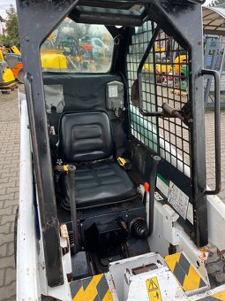 Smykový nakladač Bobcat 453, 2 lžíce 2 páry kol UNC - 17