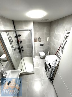 Pronájem moderního bytu 2+kk (56,6 m2) s předzahrádkou a ter - 17