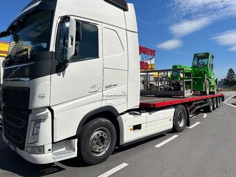 Teleskopický manipulátor, přeprava strojů - 17