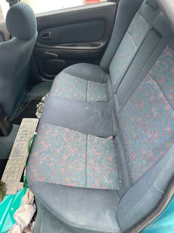 Mazda 323f 1.5 66 KW DOHC. Klima, el.okna, ALU kola - 17