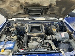 Prodám na Nissan Navara D22 4x4 2,5 nafta 98 KW rv 2003 - 17