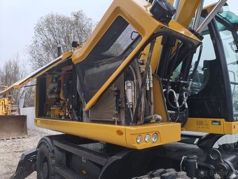 Kolový otočný bagr CAT M316 F - 17