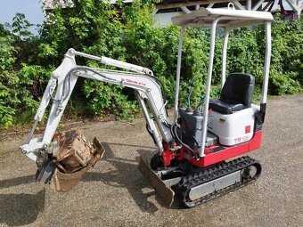 Minibagr Takeuchi 900kg. Rozsirovaci. - 17