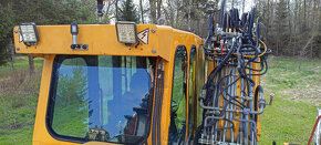 ATLAS 2-silniční kolové železniční rypadlo na koleje - 17