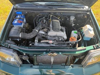 Prodám Suzuki Jimny 4x4 1,3 benz 60 KW modrl 2001 - 17