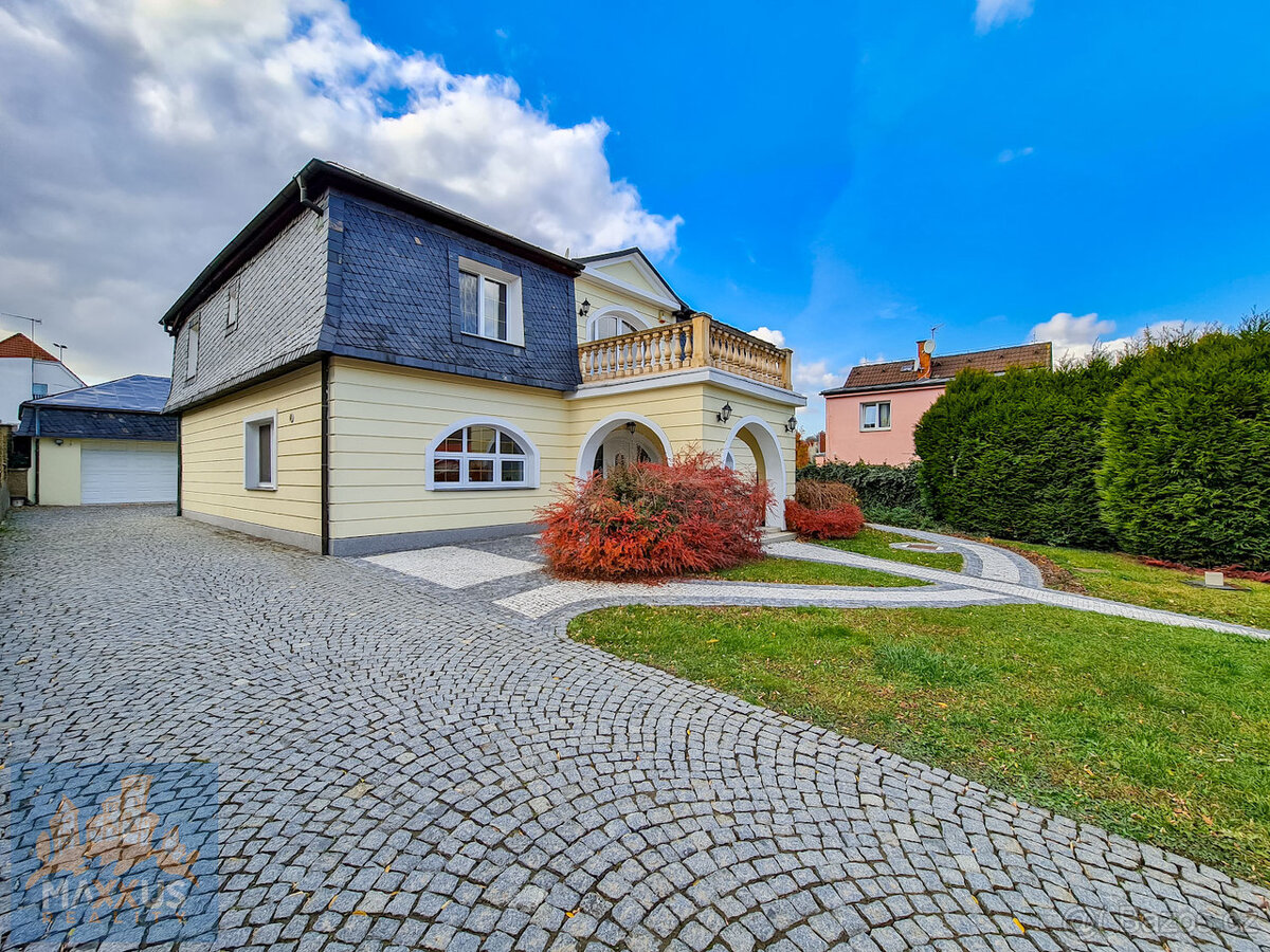 Pronájem luxusního rodinného domu 7+kk (360 m2), Praha 6 - N - 18