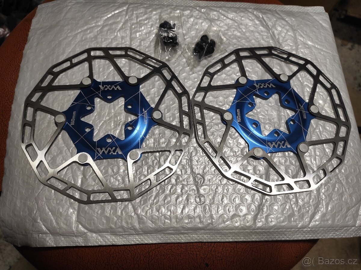 Spousta nových brzdových kotoučů 6 děr a CL. - 18