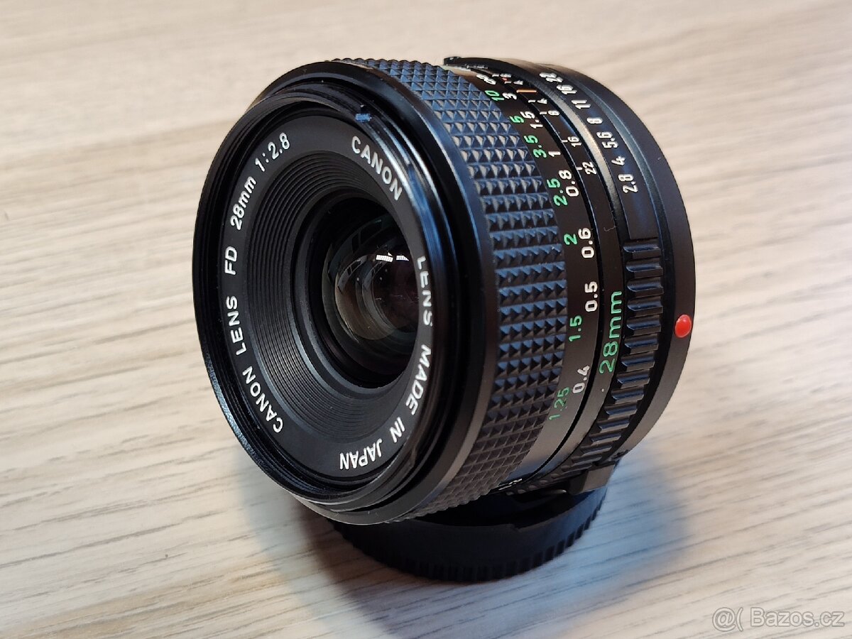 Canon A-1 + FD 28mm + příslušenství - 18