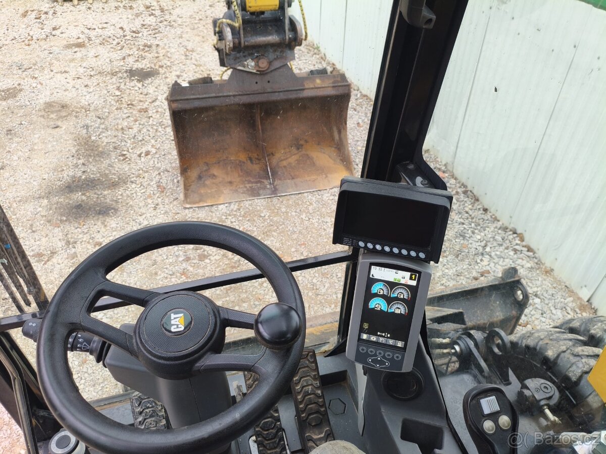 Kolový otočný bagr CAT M316 F - 18