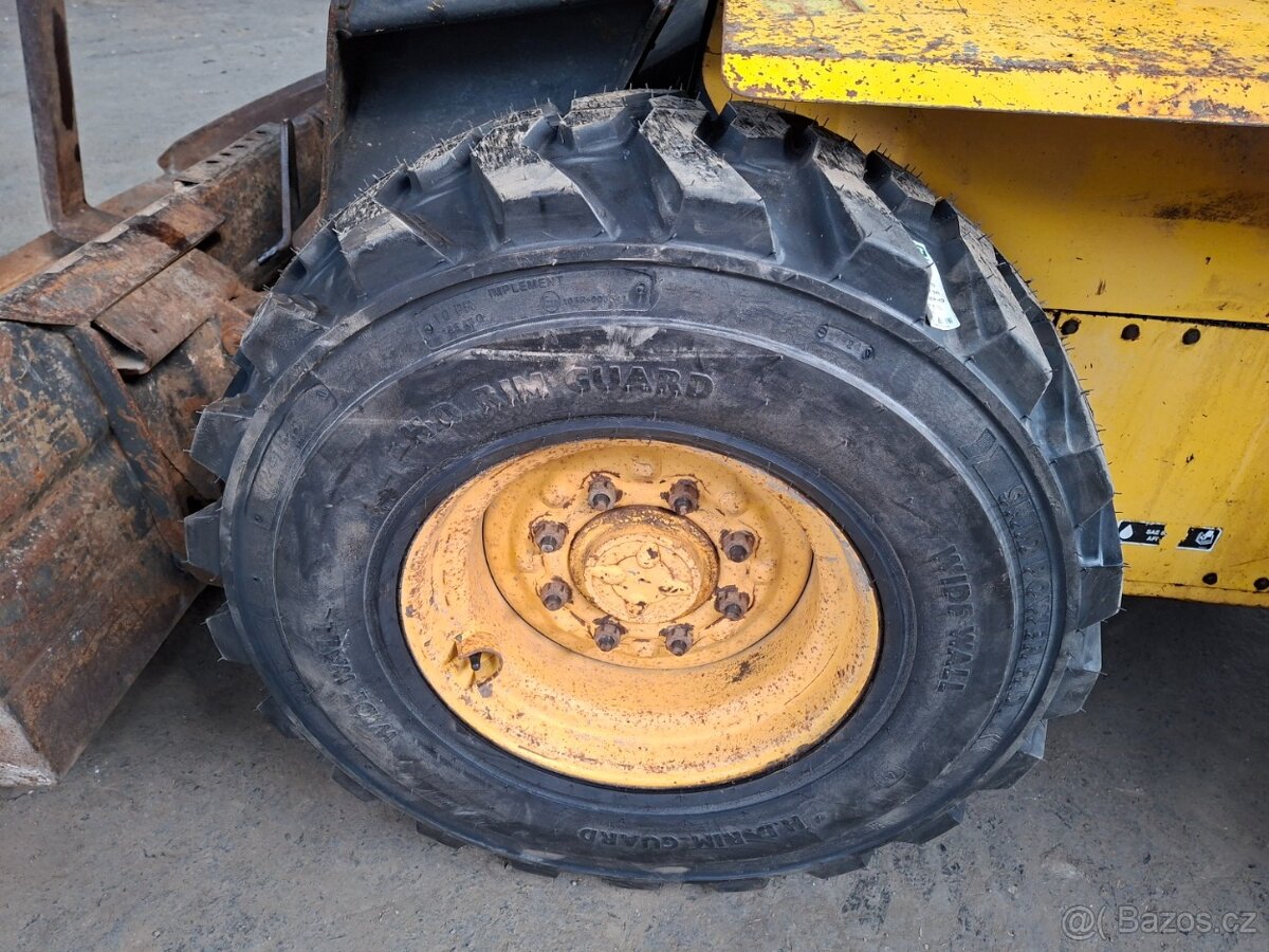 NEW HOLLAND LS 180 - 18