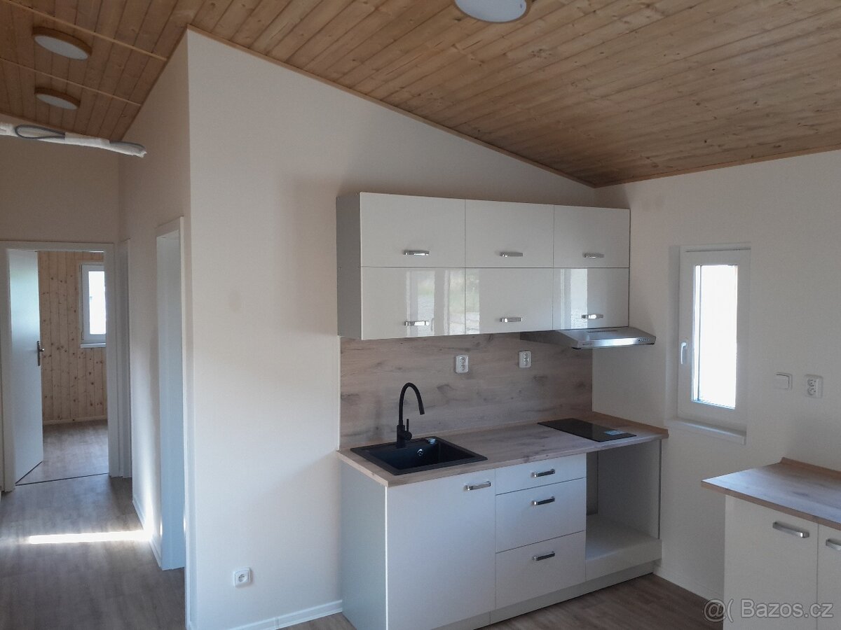 Včetně kuchyně 2+kk,komora,koupelna s wc - 18