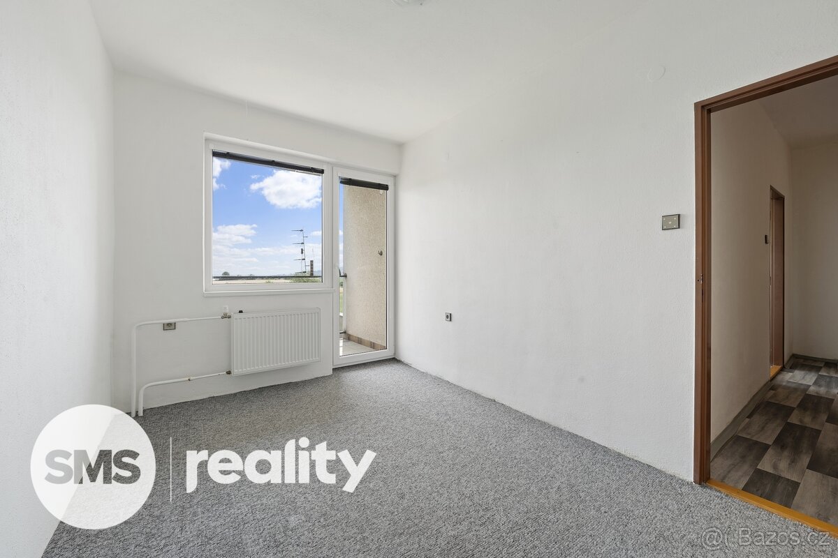 Prodej prostorného řadového domu 4+1 s garáží a zahradou – Č - 18