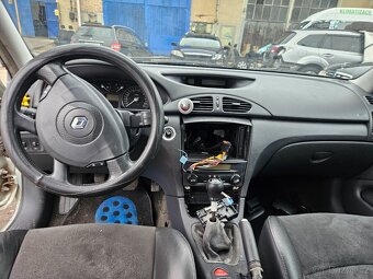 Renault laguna.        2004      1.9dci - 18