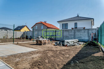 Rodinný dům s bytovou jednotkou 3+kk se zahradou a parkovací - 18