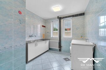 Prodej rodinného domu s garáží dílnou a zahradou - Praha - K - 18