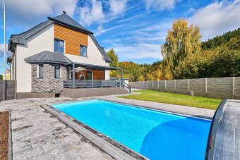 Prodej nového bytu 4+kk s terasou, bazénem a garáží - 18