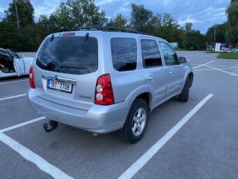 Mazda Tribute 2,3 - 18