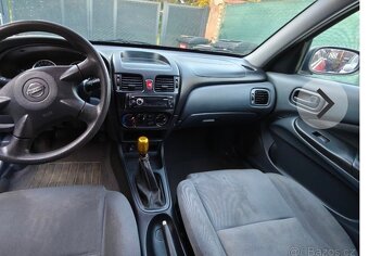 Nissan Almera 1.5i Rok 2005. Najeto 150 tis km. Klima - 18