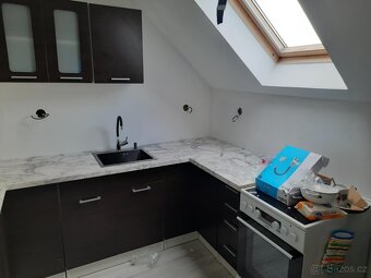 Pronájem  podkrovního bytu 1+kk Bystřice - 18