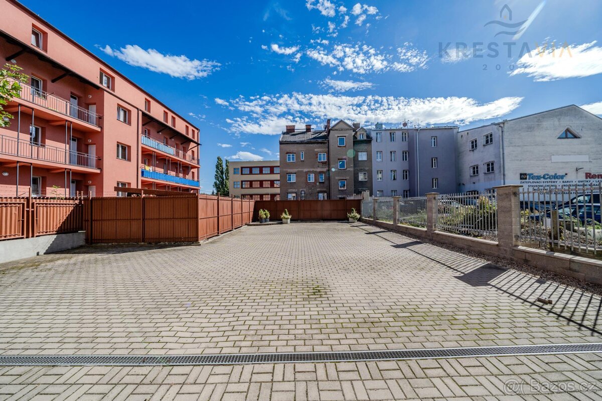 Prodej bytového domu po rekonstrukci v Ostravě 4x2+kk, tera - 19