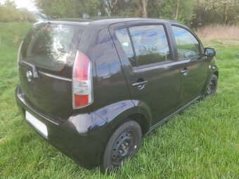 Daihatsu Sirion 4x4 1.3 16V,  64kW, 8/2006, klima - 19