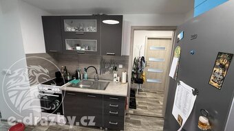 Bytový dům (5 bytů + 1 nebytový prostor) v obci Povrly, okre - 19