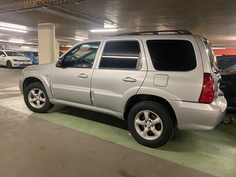 Mazda Tribute 2,3 - 19