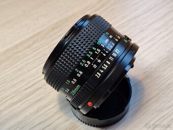 Canon A-1 + FD 28mm + příslušenství - 19