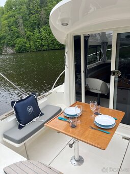 Aqualine 645 + Mercury F 150 L EFI a lodním vlekem Tema Boat - 19