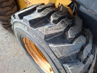 NEW HOLLAND LS 180 - 19