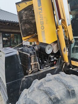 Traktor bagr MF 960 - 19