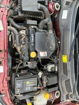 Opel astra 1.6. - 19