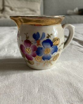různý starožitný porcelán - 19