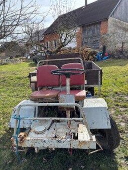 Traktor s korbou