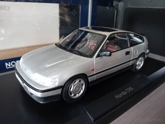 Honda CRX 1990 a Volvo 1800 S 1969 ltd.1/500  1:18  Norev