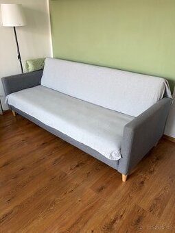 Rozkládací šedý gauč 208 cm – funkční, poškozený potah
