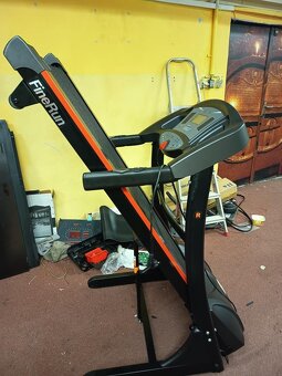 Běžící pás Fire Rum