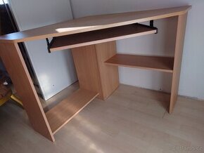 Rohovy psaci stul.