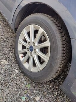 disky+ zimními pneu 215/55 R16 levně