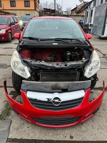 Opel Corsa D  Díly  Nárazník světlo dveře Čelo