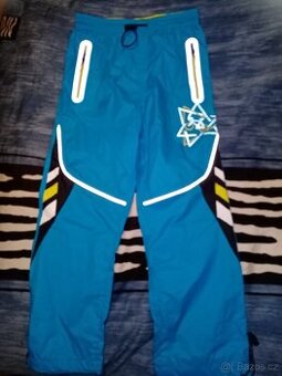 Kalhoty lehké v. 122 zn. Kugo nové