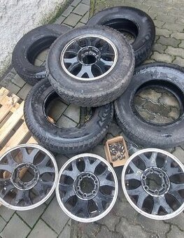 SsangYong Rexton I - 4x alu kola + jeté celoroční pneu