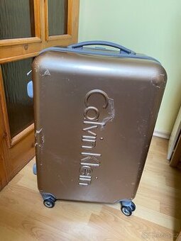 Cestovní kufr na kolečkách Calvin Klein zlatá barva