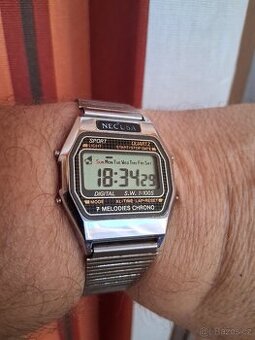 REZERVACE.Digitální hodinky NEC USA