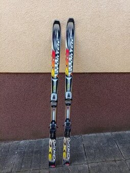 Lyže Atomic 180 cm, Sporten 148 cm, hůlky 4x