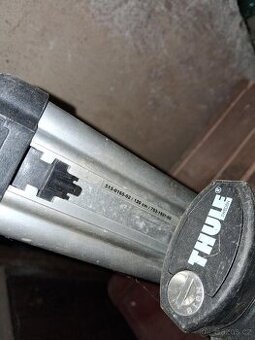 Příčníky a střešní box Thule