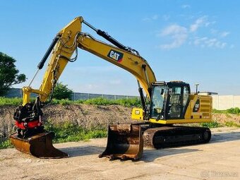 Pásový bagr Caterpillar 323 - 1
